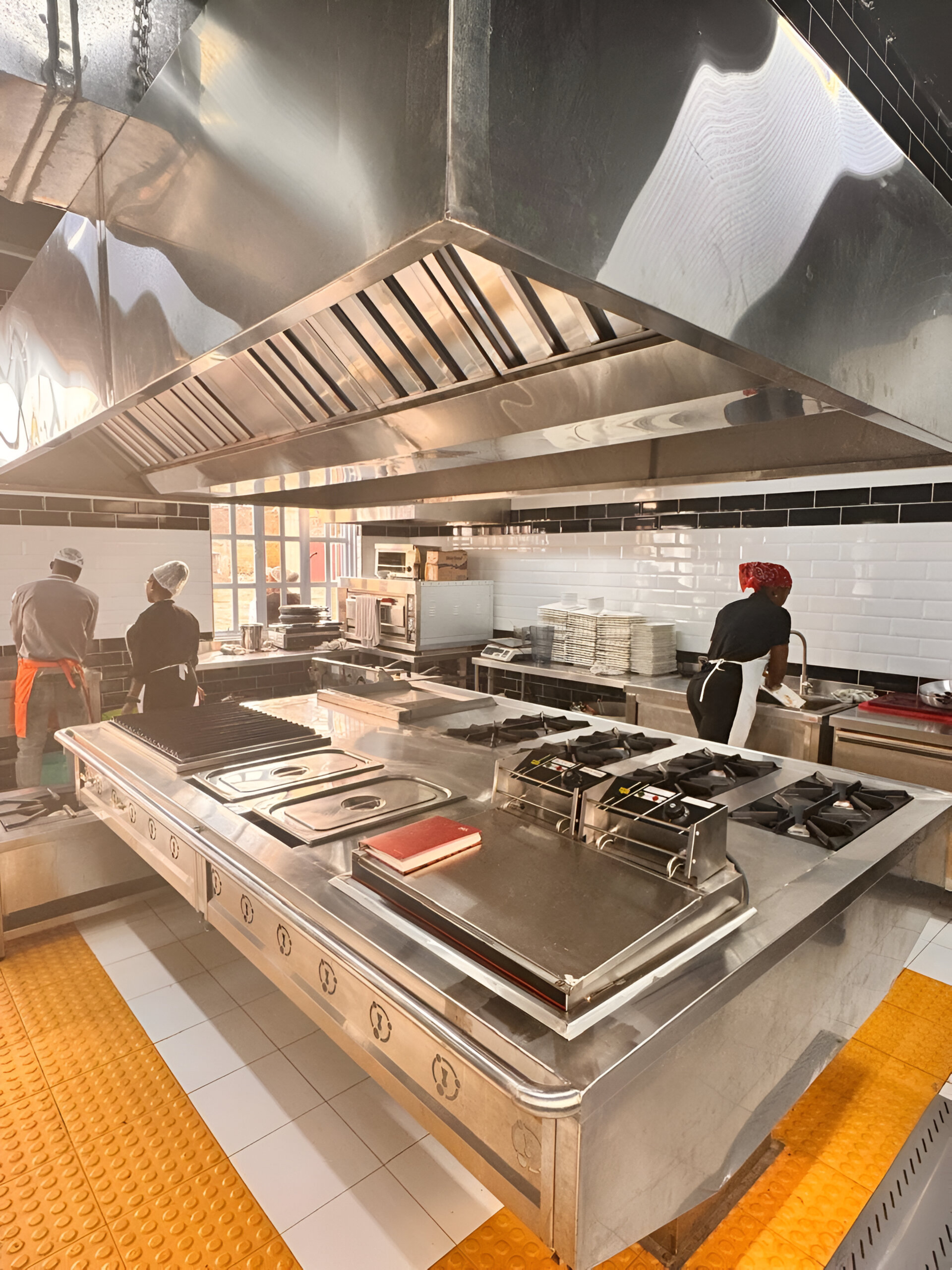 Commercial kitchen with hood ventilation
